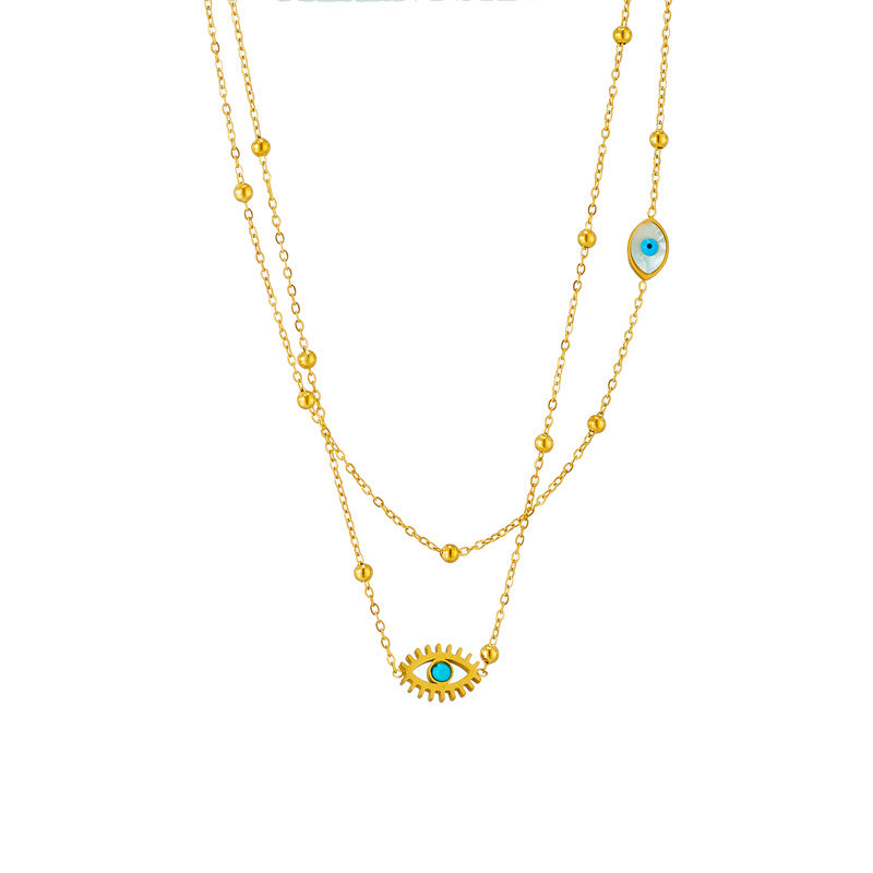 European and American niche fashion design double-layer mixed chain gold bead titanium steel drip oil hollow blue eye pendant necklace