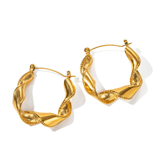 Rusty steel wavy gold earrings with a niche and high-end vibe for women