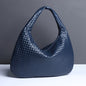 Crescent shaped women's bag hand woven hand-held dumpling bag