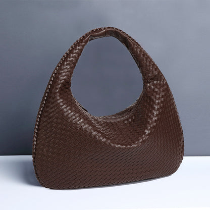 Crescent shaped women's bag hand woven hand-held dumpling bag