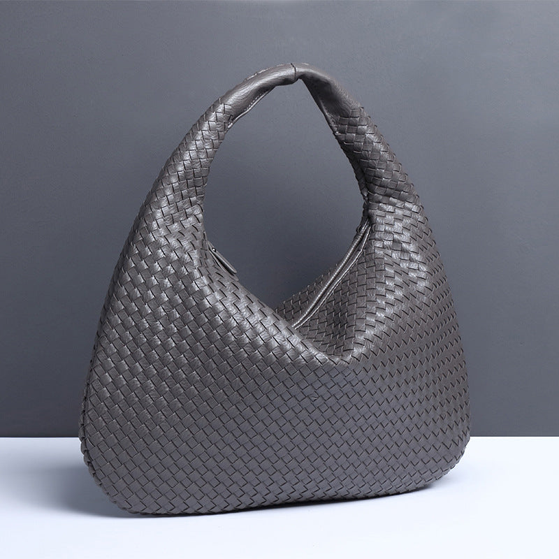 Crescent shaped women's bag hand woven hand-held dumpling bag