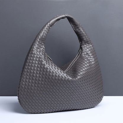 Crescent shaped women's bag hand woven hand-held dumpling bag