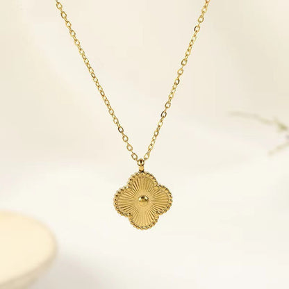 This four-leaf clover is plated with 18k gold titanium steel lucky four-leaf clover bracelet necklace