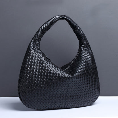 Crescent shaped women's bag hand woven hand-held dumpling bag