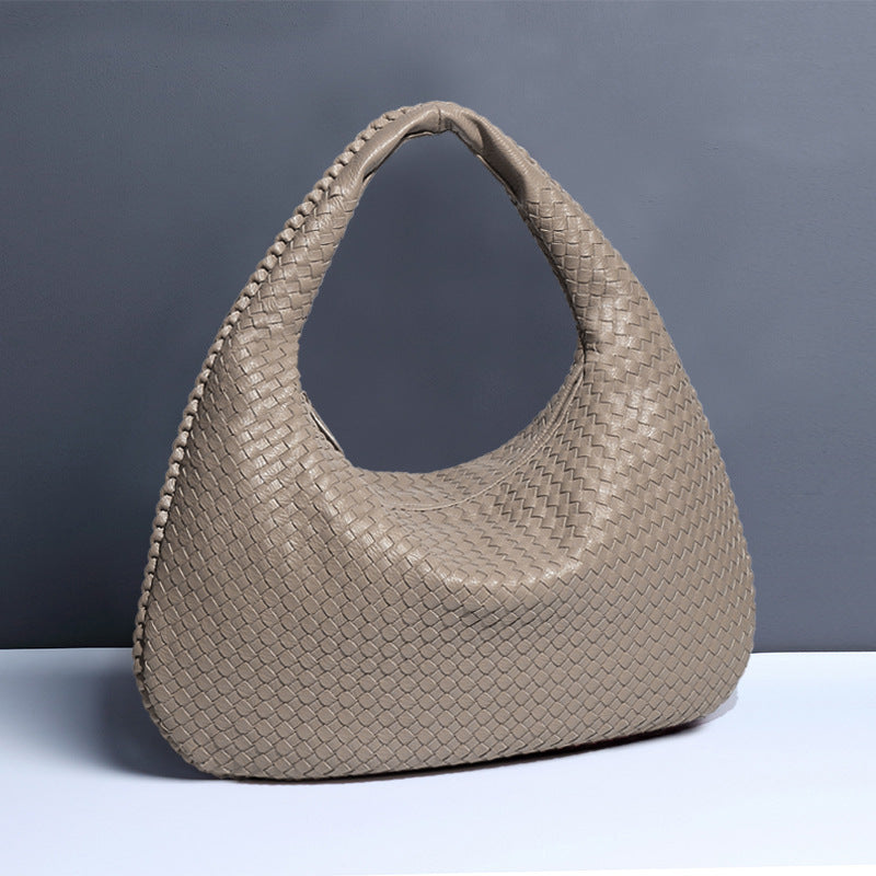 Crescent shaped women's bag hand woven hand-held dumpling bag