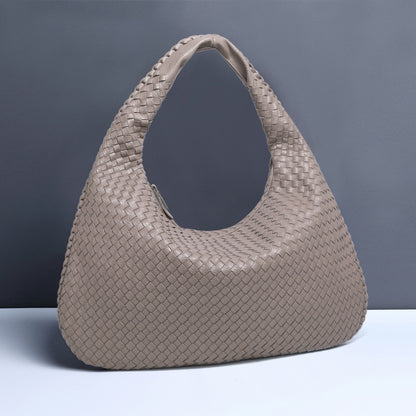 Crescent shaped women's bag hand woven hand-held dumpling bag