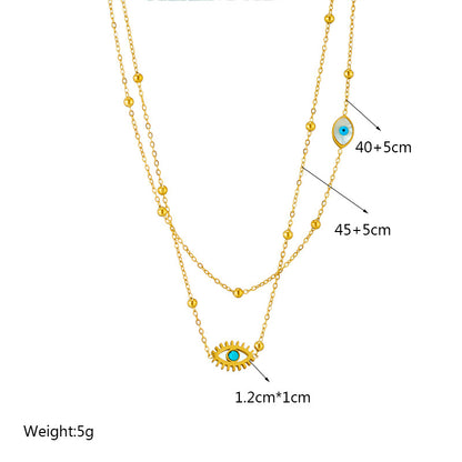 European and American niche fashion design double-layer mixed chain gold bead titanium steel drip oil hollow blue eye pendant necklace