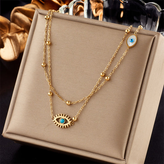 European and American niche fashion design double-layer mixed chain gold bead titanium steel drip oil hollow blue eye pendant necklace