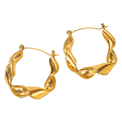 Rusty steel wavy gold earrings with a niche and high-end vibe for women