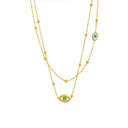 European and American niche fashion design double-layer mixed chain gold bead titanium steel drip oil hollow blue eye pendant necklace